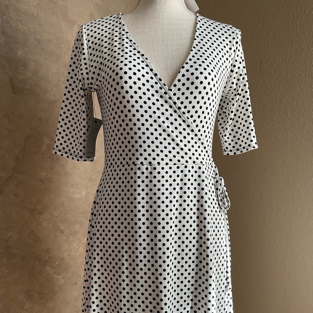 Fun poke-a-dot faux wrap dress